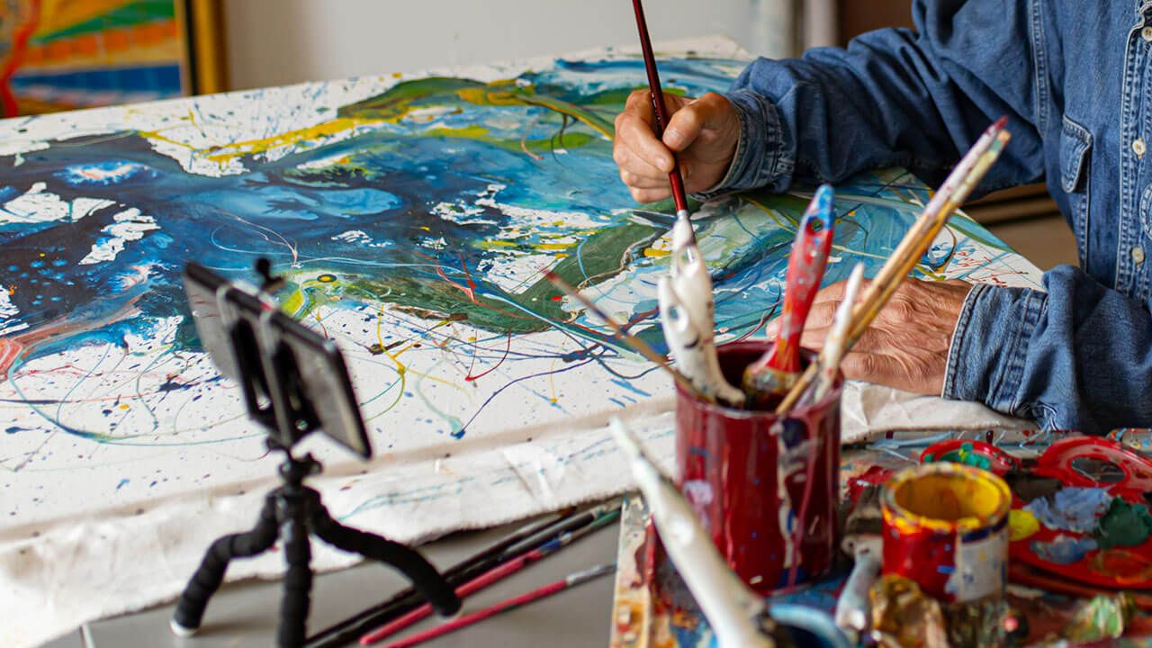 Artist filming creative content