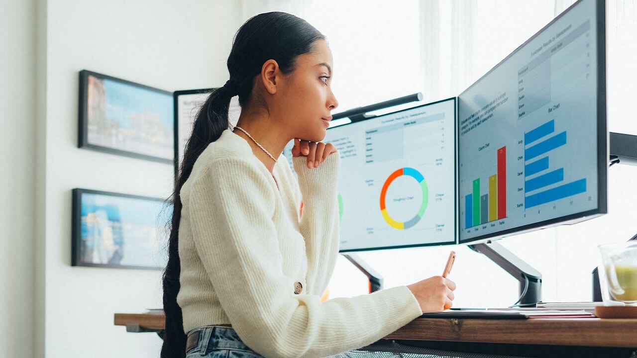 Marketer planning on whiteboard