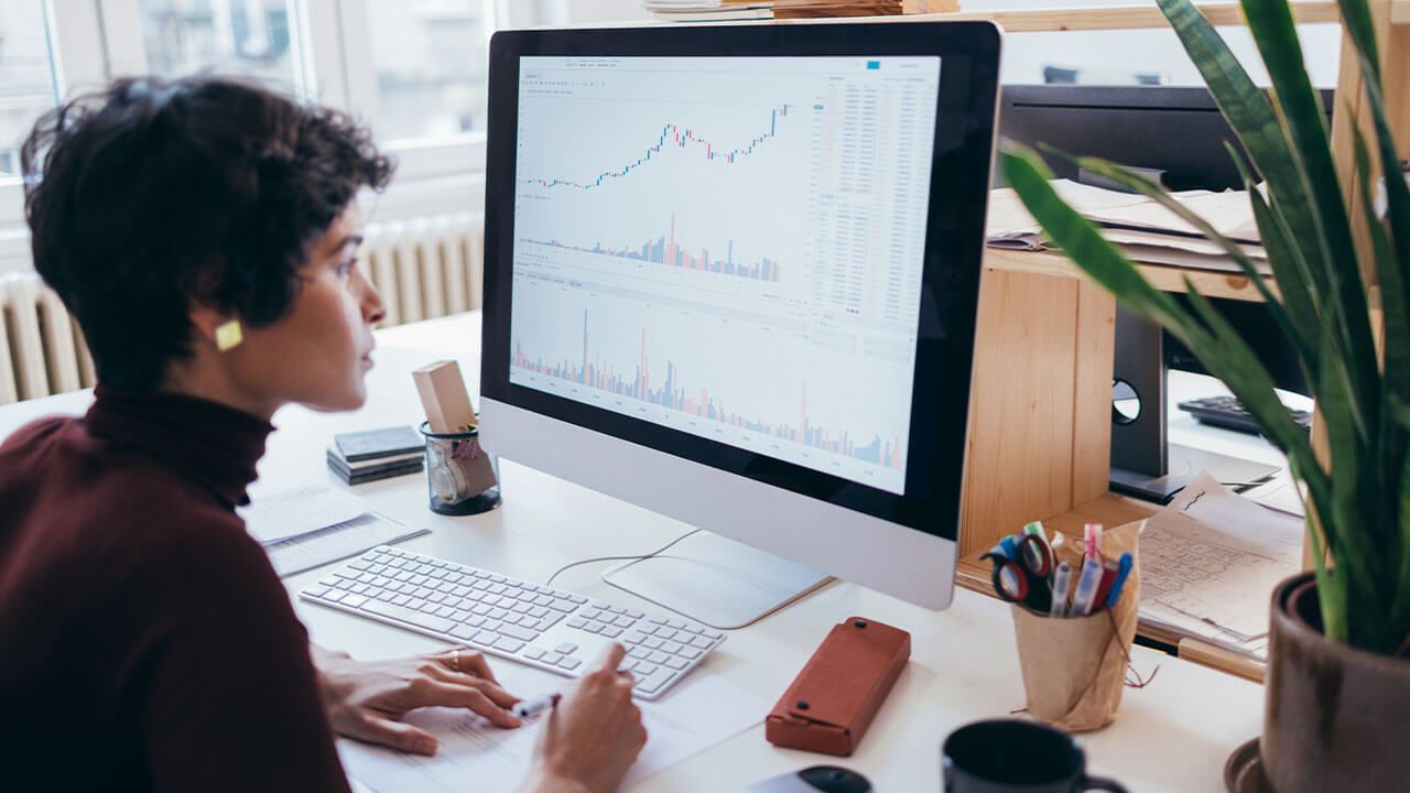analyzing pricing data on screen