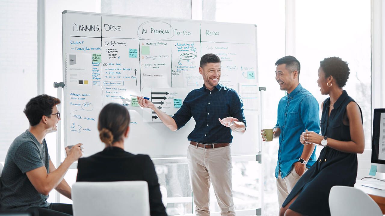 Marketers planning on whiteboard