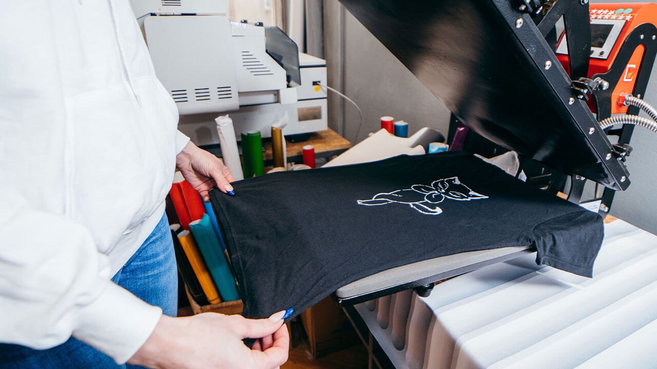 Using heat press on t-shirt