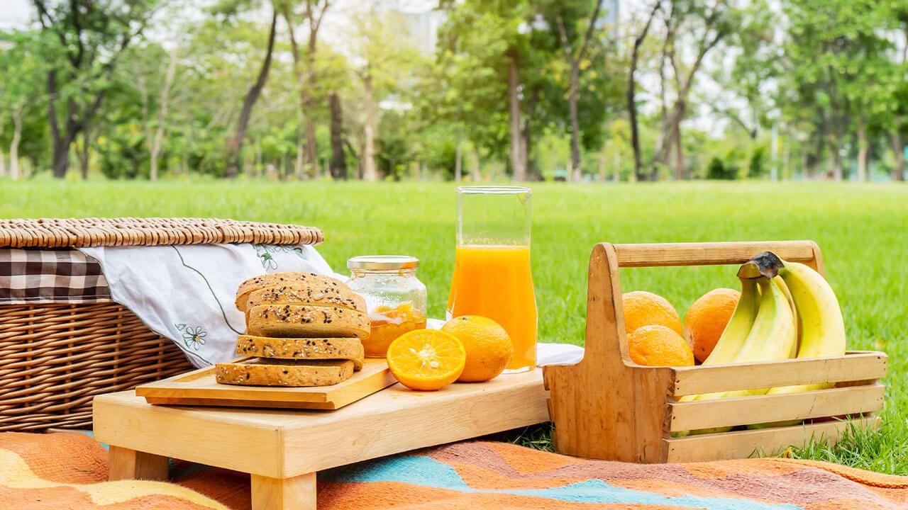 Picnic baskets in grass