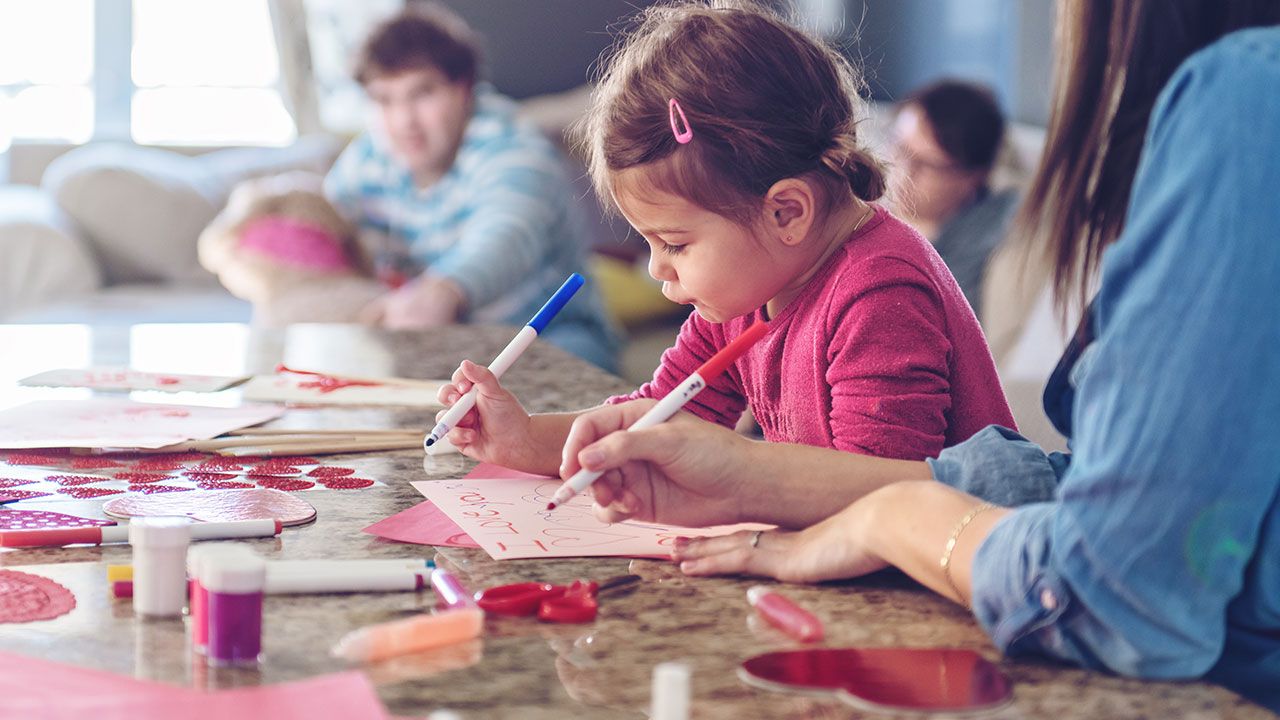 Kids making DIY Valentine’s cards