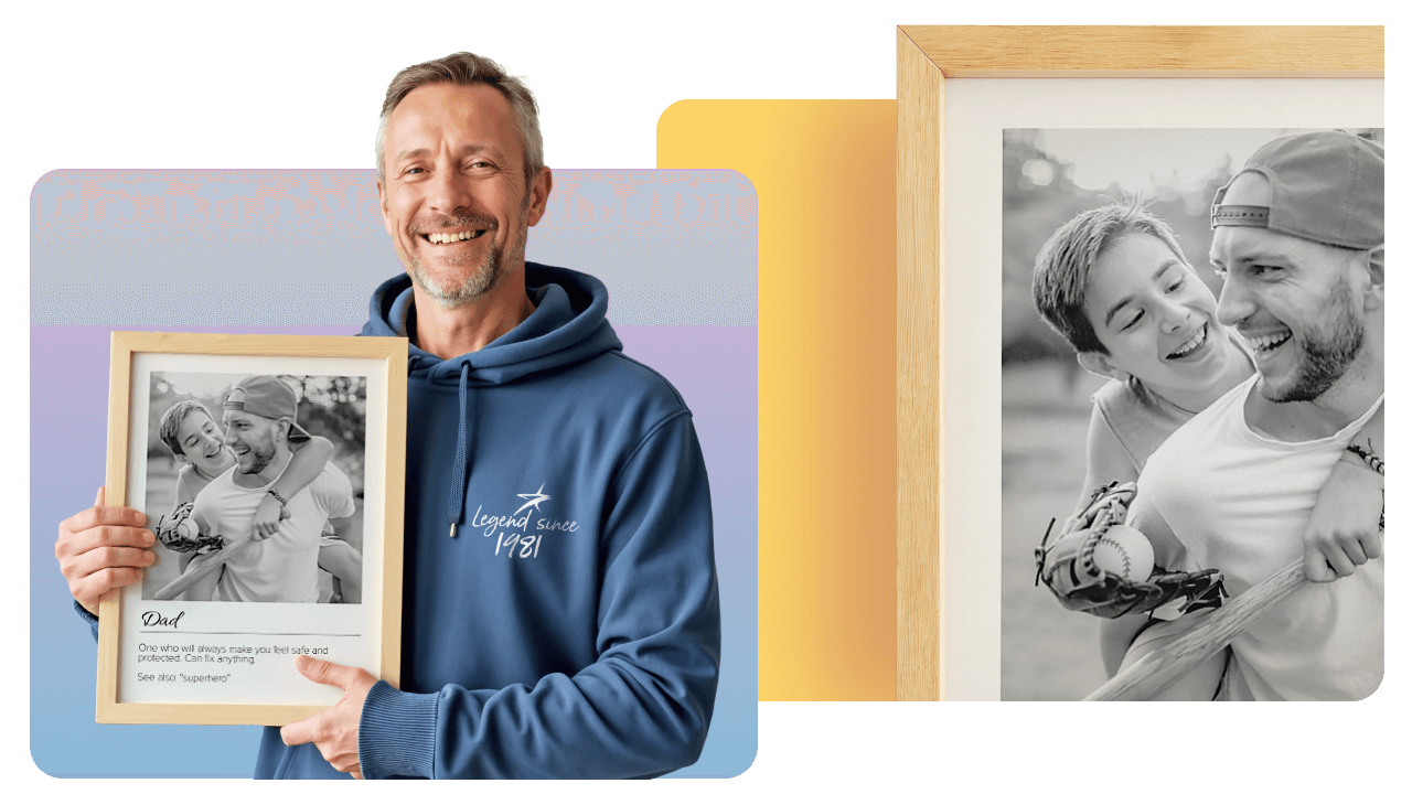 Smiling man in a blue hoodie holds a framed photo of a happy couple playing. Another framed photo of a playful duo is in the background.