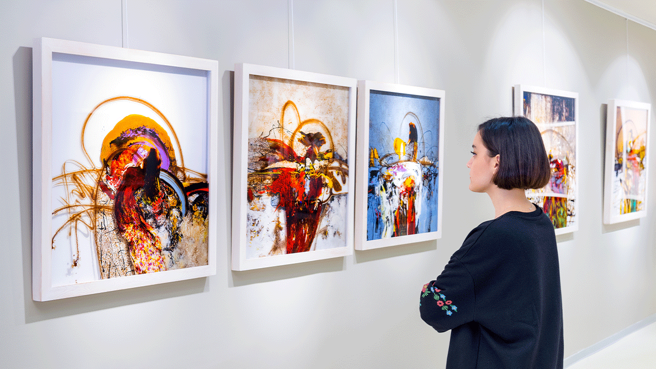 Artist reflecting on artwork