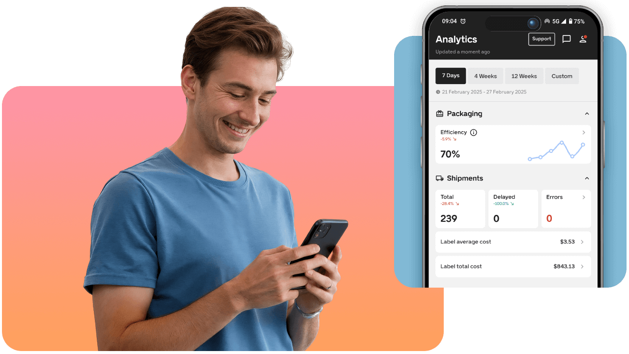 Smiling man in blue shirt uses smartphone, with a mobile analytics dashboard displaying shipment data and efficiency on the screen.